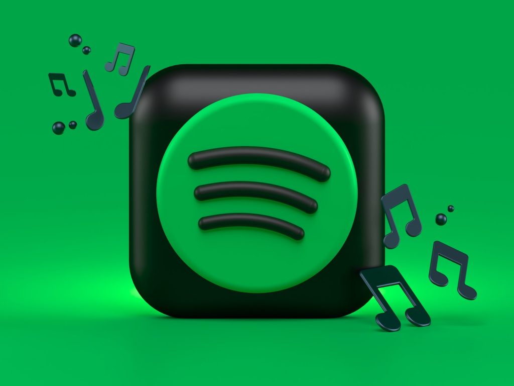 green and white spotify logo illustration